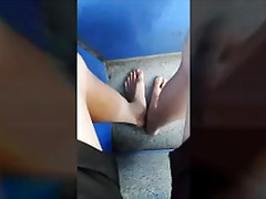 Jon Arteen walks barefoot on the street outdoors, the boy is barefoot in the crowded tram to the town center